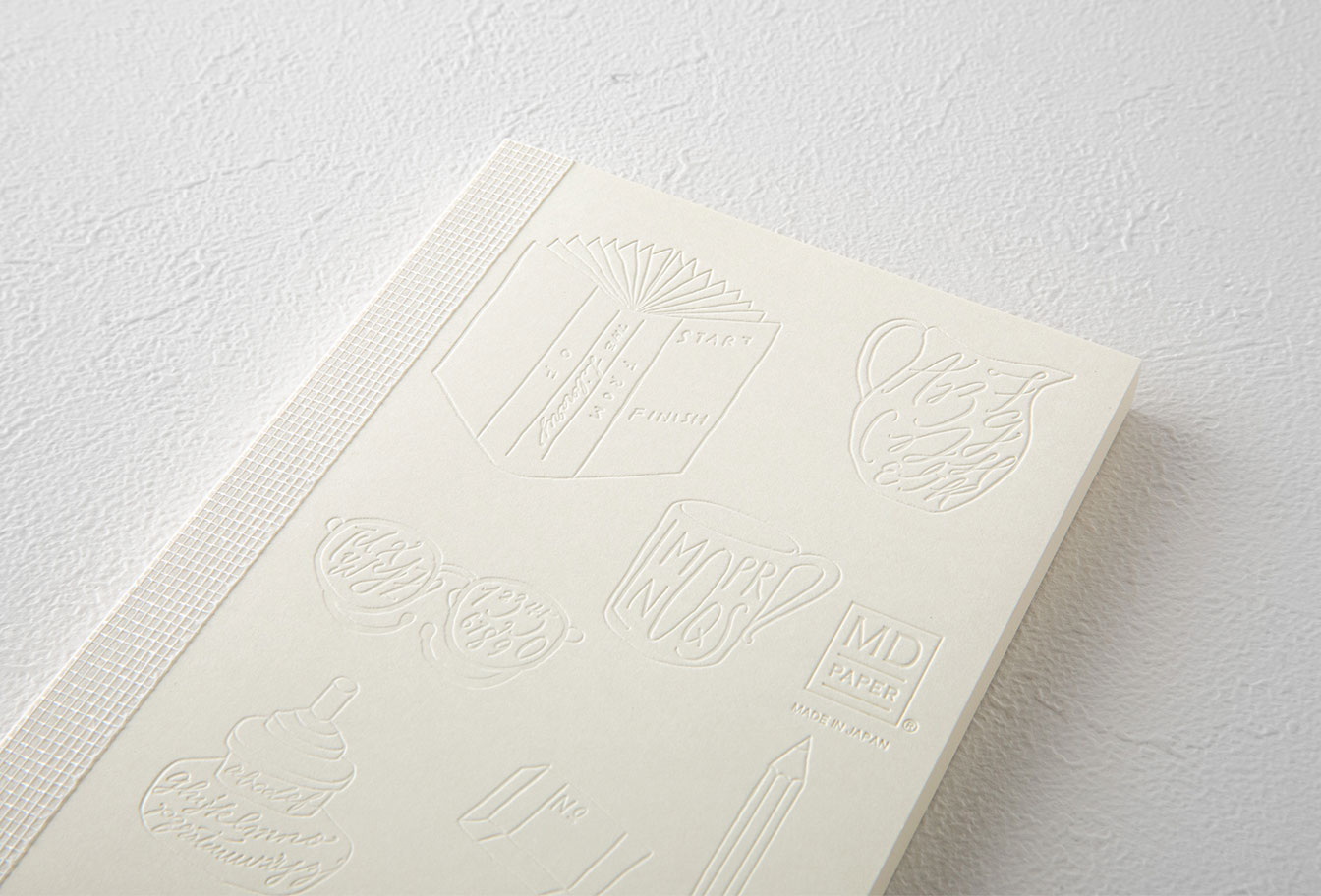 MD Notebook 15th – Edition Mikiko Ayamiya - A6 - blanko / blank - Midori Notizbuch - limitiert MD Notebook 15th – Edition Mikiko Ayamiya - A6 - blanko / blank - Midori Notizbuch - limitiert