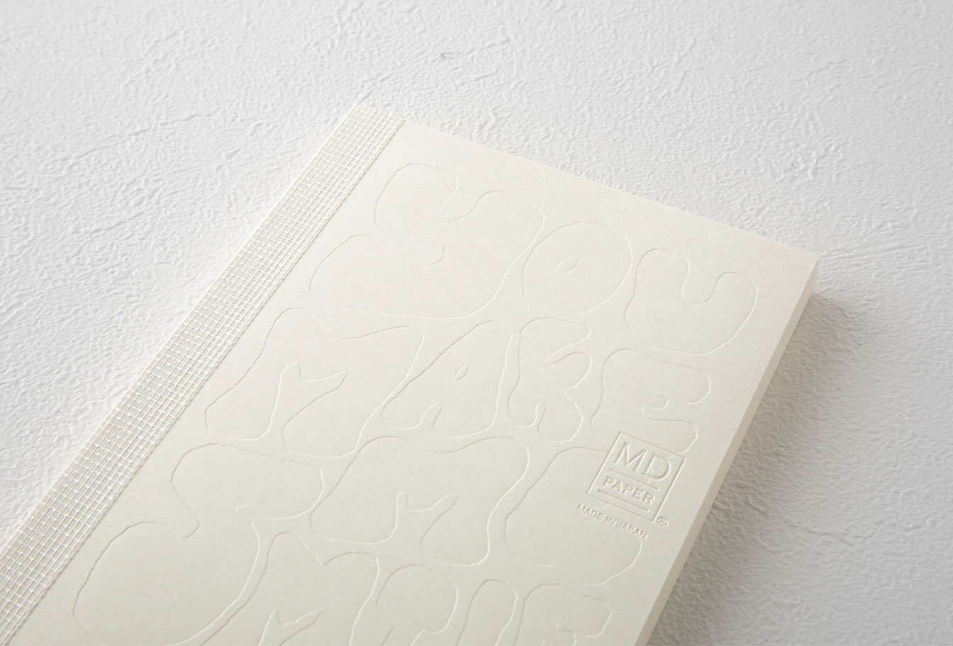 MD Notebook 15th – Edition Charlene Man - A6 - blanko / blank - Midori Notizbuch - limitiert MD Notebook 15th – Edition Charlene Man - A6 - blanko / blank - Midori Notizbuch - limitiert