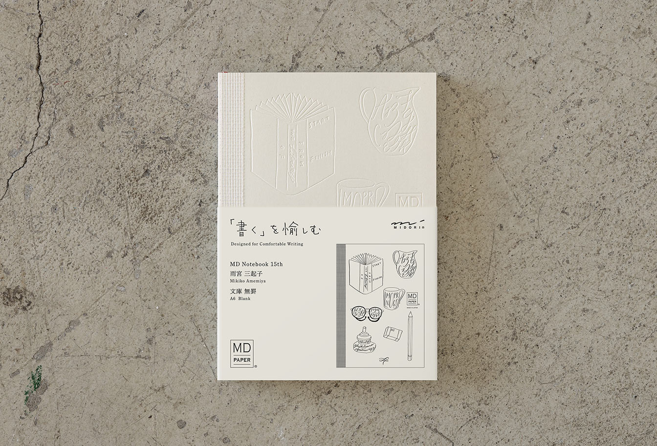MD Notebook 15th – Edition Mikiko Ayamiya - A6 - blanko / blank - Midori Notizbuch - limitiert MD Notebook 15th – Edition Mikiko Ayamiya - A6 - blanko / blank - Midori Notizbuch - limitiert